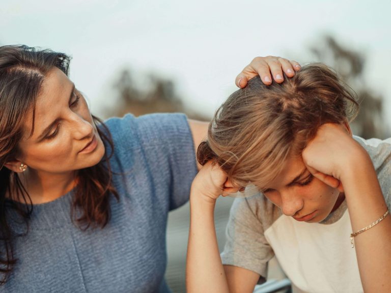 Mother comforting son. Helping anxious children understand what they can control.